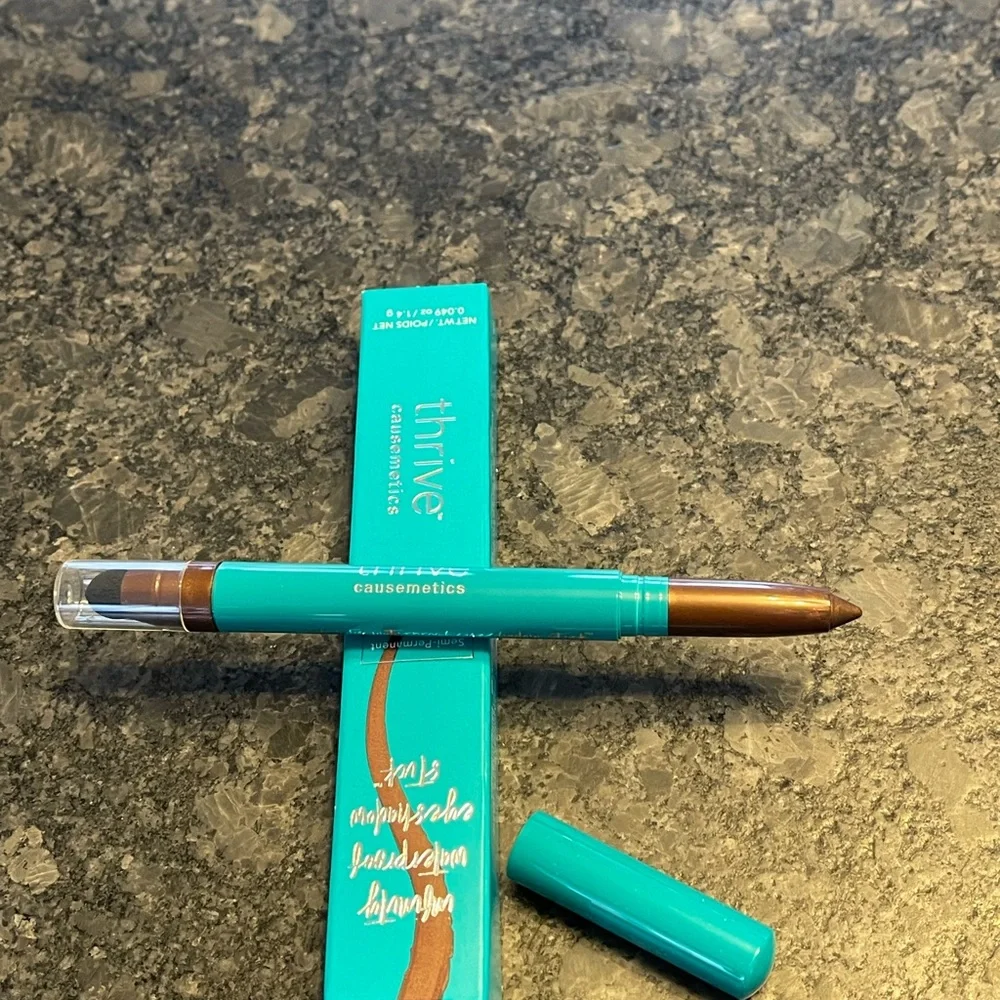 Thrive Causemetics Infinity Eyeshadow Stick in Riji  (cocoa shimmer)
